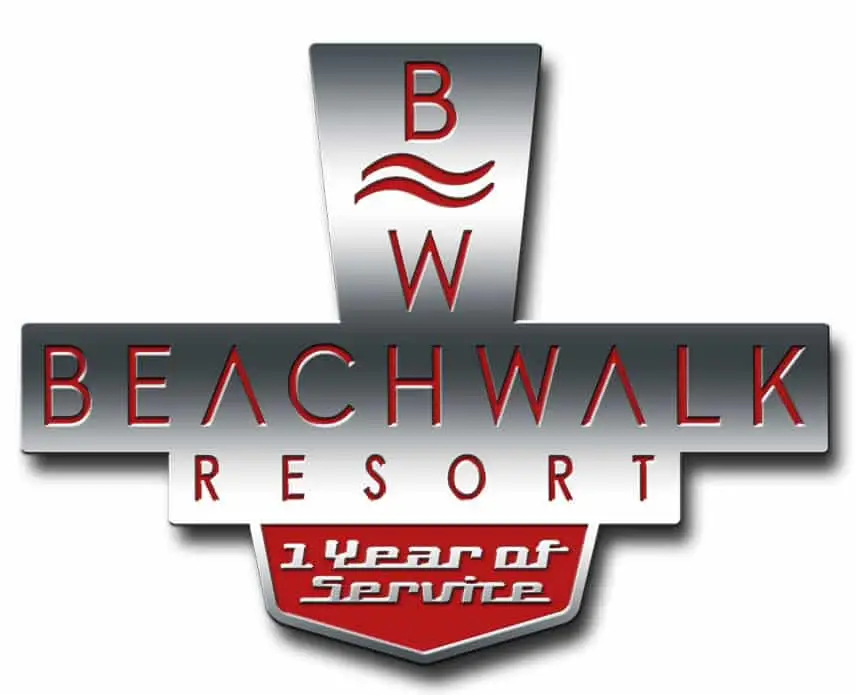 Logo for Beachwalk Resort celebrating 1 Year of Service. Designed in silver and red, it resembles a years of service pin, with stylized waves above the letters BW and the text BEACHWALK RESORT prominently displayed.