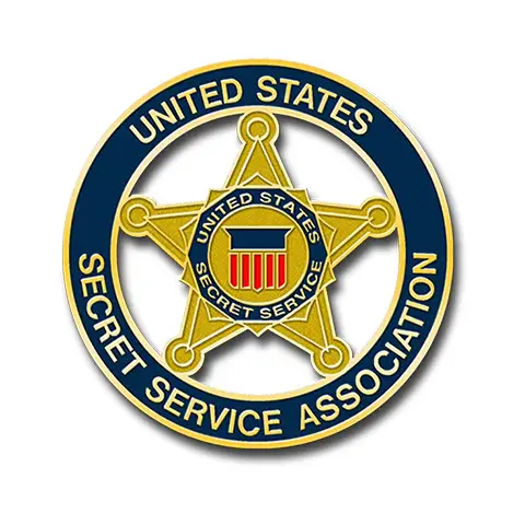 The circular badge, reminiscent of Cooperstown Pins, showcases a gold five-pointed star with a central shield emblem. Encircled by a deep blue border, it proudly reads United States Secret Service Association in elegant gold lettering.