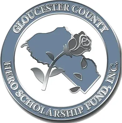 A circular emblem custom made, featuring Gloucester County Hero Scholarship Fund, Inc. around the border. Inside, a rose overlays a blue silhouette of the Gloucester County map.