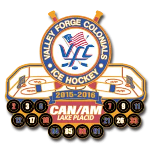 Valley Forge Colonials Ice Hockey logo for the 2015-2016 season at CAN/AM Lake Placid. Features a stylized rink, crossed hockey sticks, pucks with numbers, and the initials VFC with an American flag design.