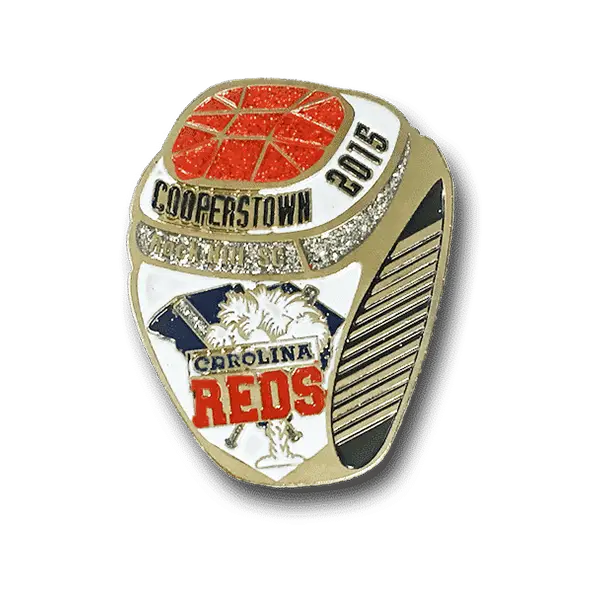 A gold and silver sports pin featuring a red basketball, COOPERSTOWN and 2015 text intertwined with baseball imagery. CAROLINA REDS is boldly written in red and blue alongside a bat and glove, epitomizing Cooperstown trading pins unique charm.