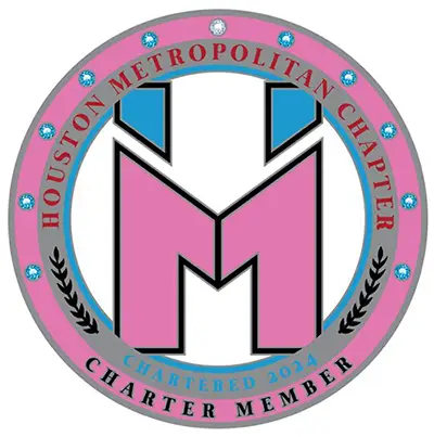 Custom enamel trading pin with pink, black, and blue M, Houston Metropolitan Charter Member 2024; blue gems, laurel edge.
