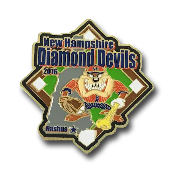 This soft enamel pin showcases a cartoon character in a baseball uniform, complete with bat and glove. The text proudly displays New Hampshire Diamond Devils 2016 with Nashua and a star beneath, capturing the spirit of the game.